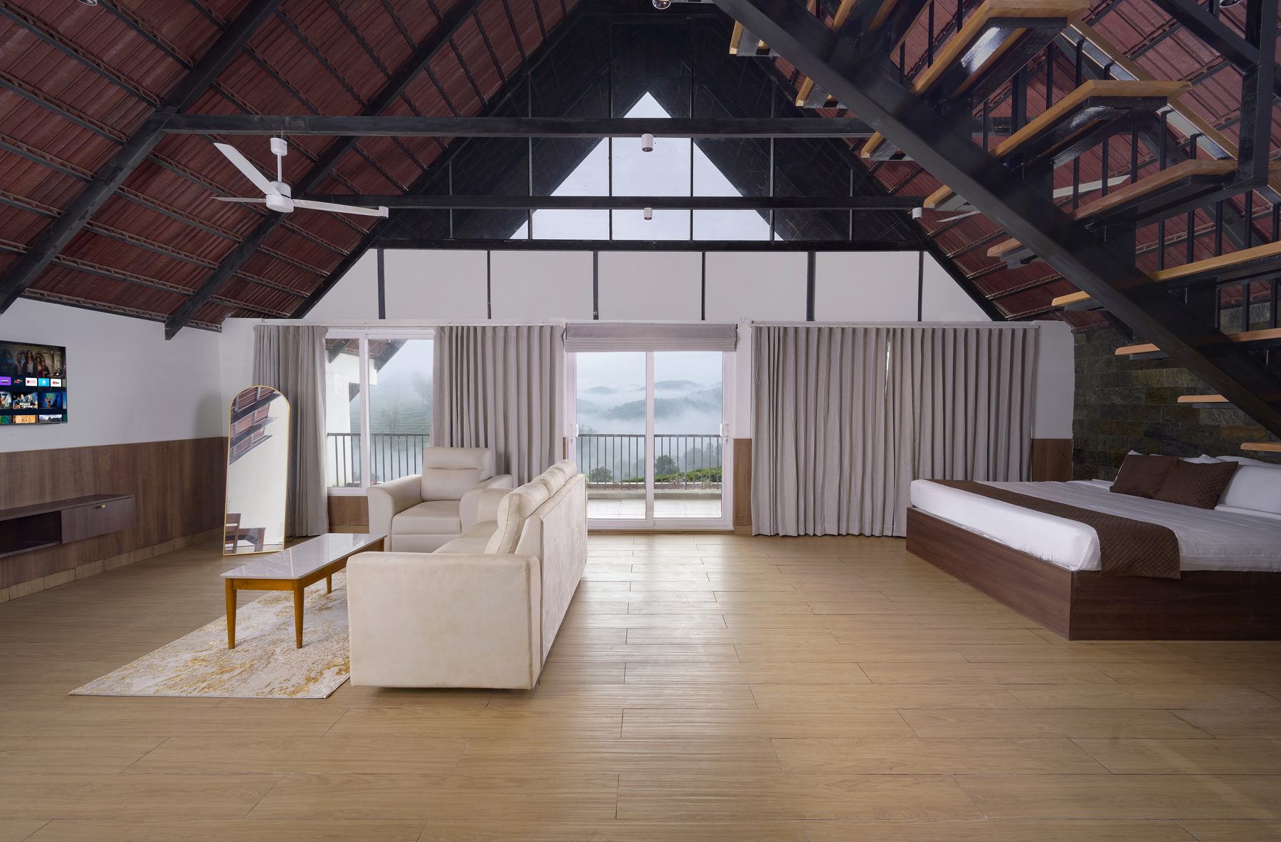 The Reach Vagamon — A-Frame Loft — the A-frame interior under the timber pitch