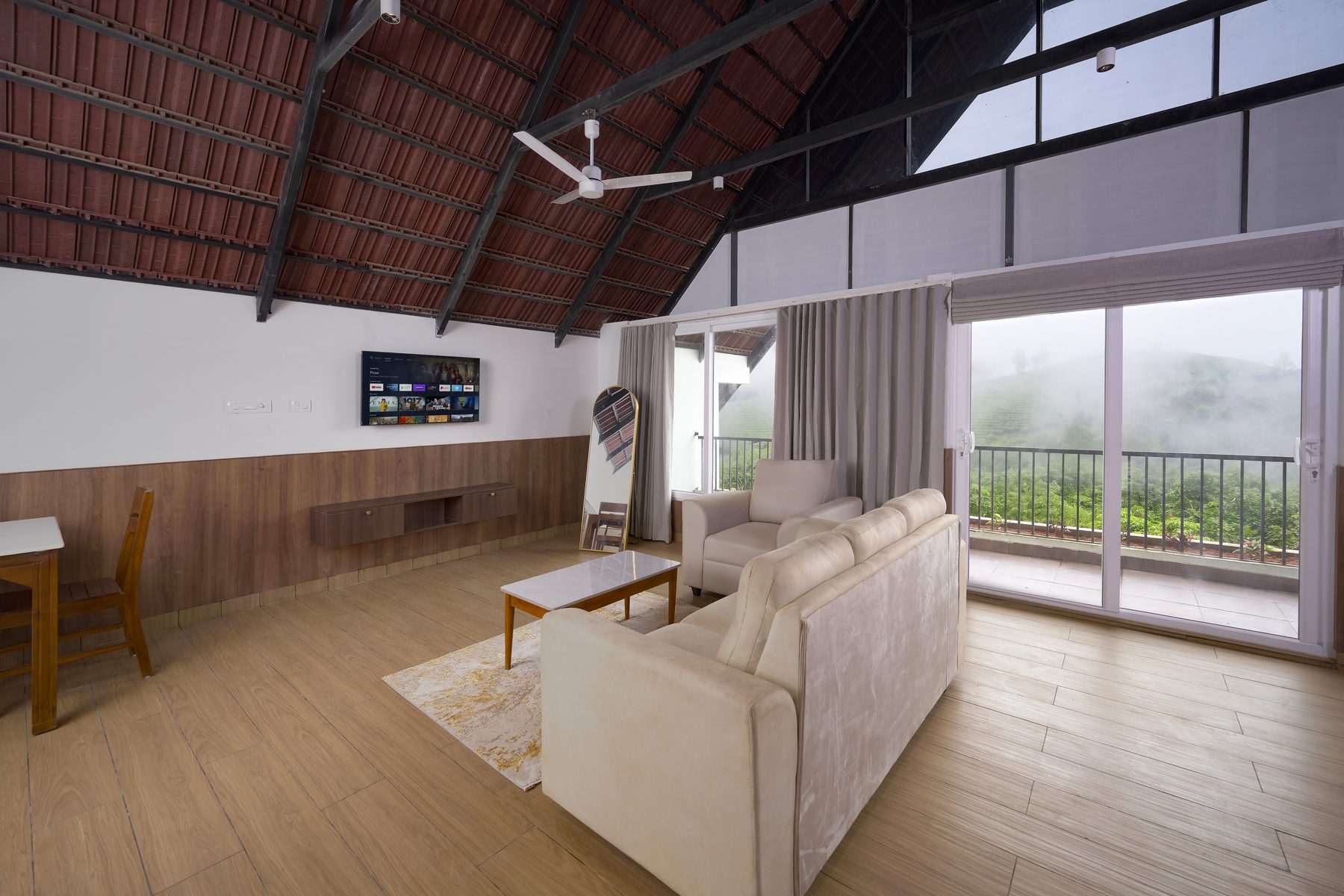 The Reach Vagamon — A-Frame Loft — living room and balcony