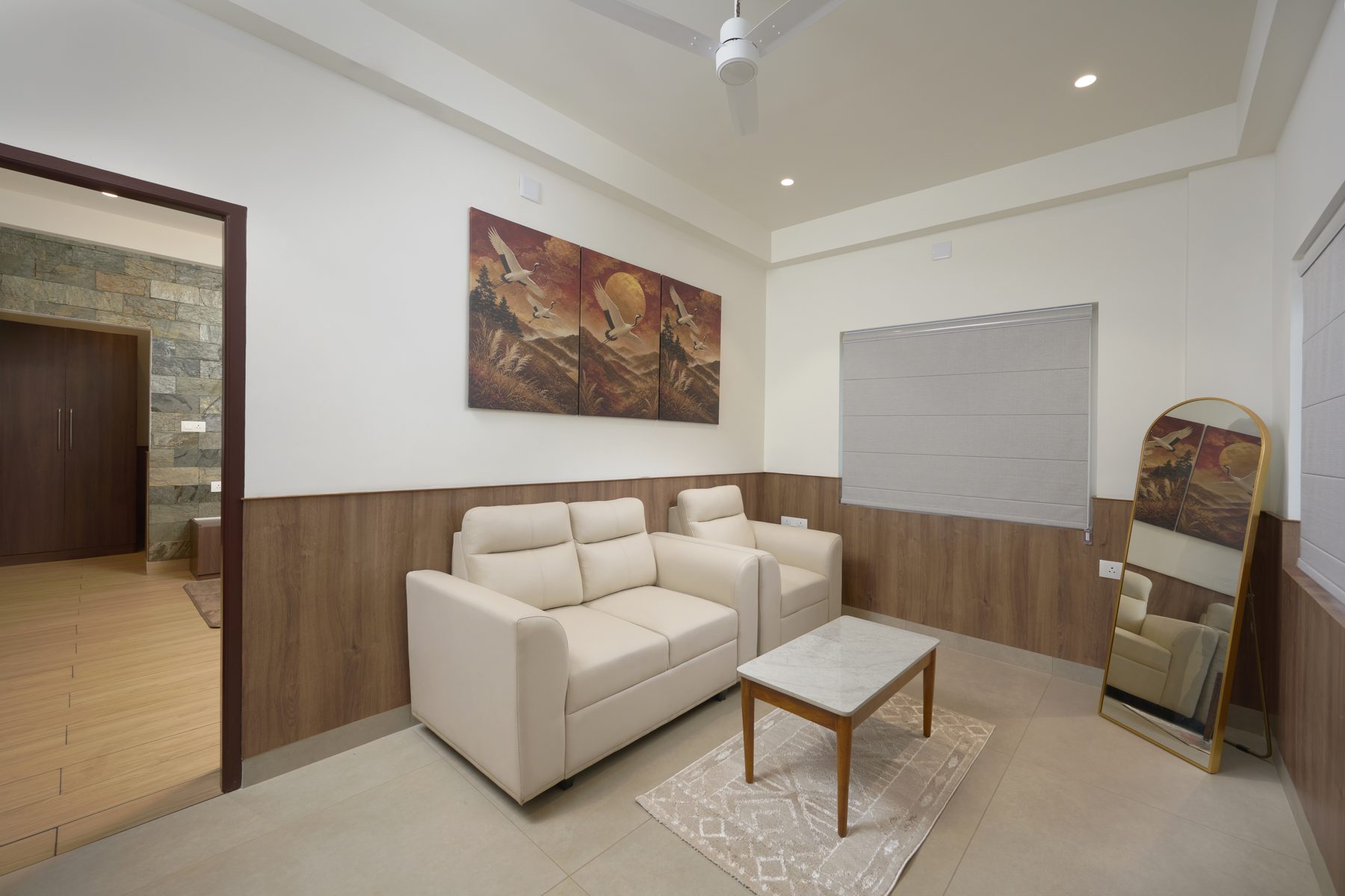 The Reach Vagamon — Suite Room — living room and full-length mirror